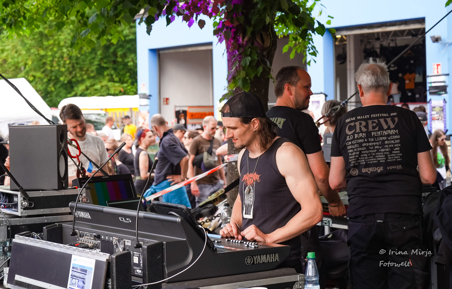 Tobias Forneberg mixing live sound at Freak Valley Festival with professional audio equipment and mixing console